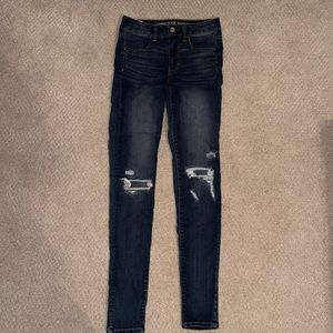 American Eagle dark wash ripped knees super stretch skinny jeans